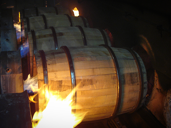 Bourbon barrels being charred at Independent Stave Company's cooperage in Lebanon, Kentucky.