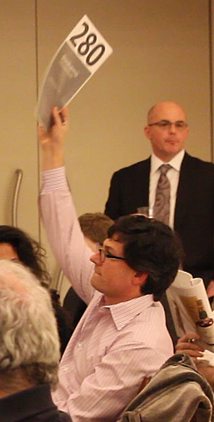 A bidder at the Bonhams auction in New York City.