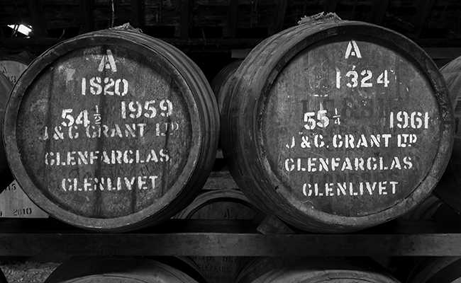 Casks of vintage Scotch Whisky maturing in a warehouse at Glenfarclas Distillery. Photo ©2015, Mark Gillespie/CaskStrength Media.