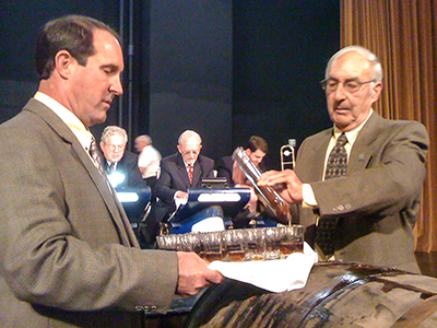 Parker Beam (R) and Craig Beam pour the first samples of the 2010 Evan Williams Single Barrel Bourbon on October 24, 2009 in Louisville, Kentucky. ©2009, Mark Gillespie/CaskStrength Media.