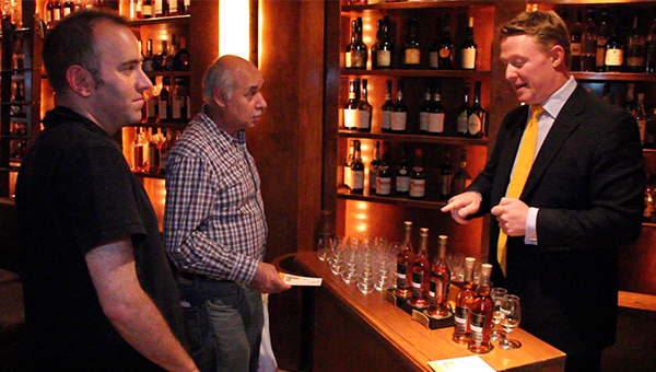 Glenmorangie's David Blackmore pours Cask Masters samples during a tasting at New York City's Brandy Library on July 9, 2013. Photo ©2013 by Mark Gillespie.