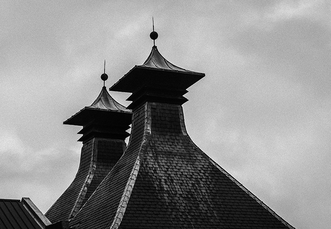 The twin pagodas at Islay's Ardbeg Distillery. Photo ©2016, Mark Gillespie, CaskStrength Media.