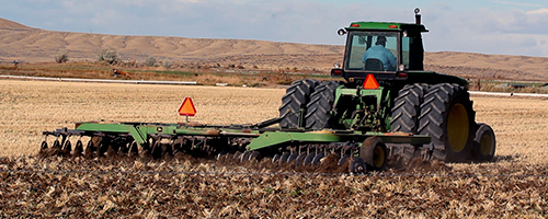 A farmer tilling his grain fields in Wyoming. File photo ©2017, Mark Gillespie/CaskStrength Media.