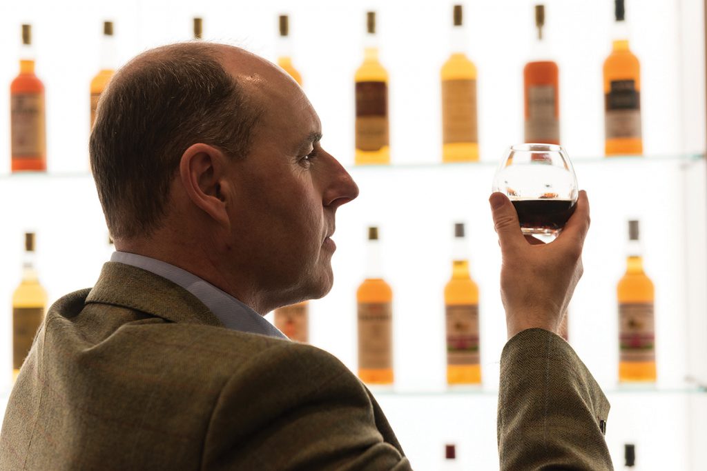 Gordon & MacPhail's Stephen Rankin with a glass of the Private Collection Glenlivet 1943. Image courtesy Gordon & MacPhail.