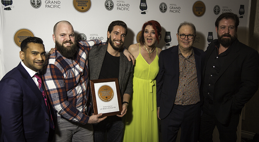 Corby Spirit & Wine executives celebrate with Heather Leary and Davin de Kergommeaux of the Canadian Whisky Awards. Photo ©2018, Mark Gillespie/CaskStrength Media.