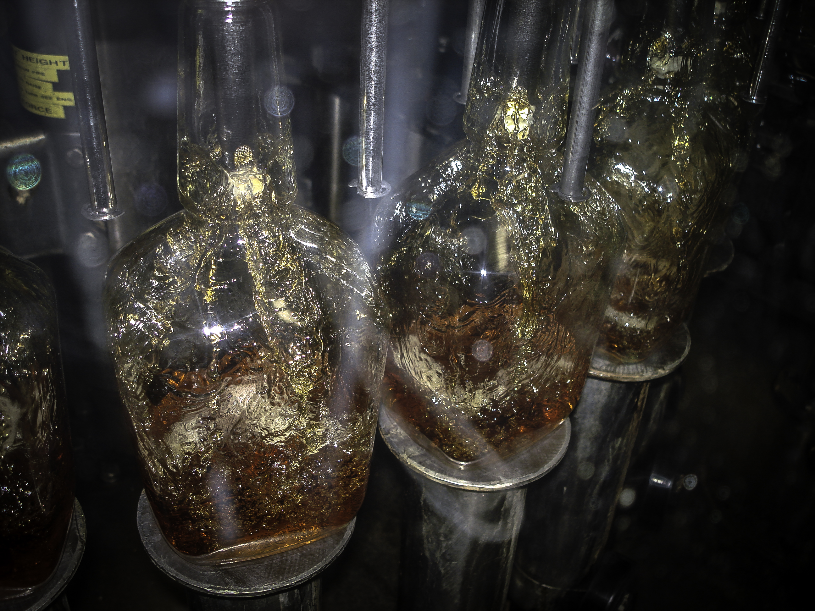 Maker’s Mark Bourbon bottles being filled with whisky in Loretto, Kentucky. File Photo ©2018, Mark Gillespie/CaskStrength Media.