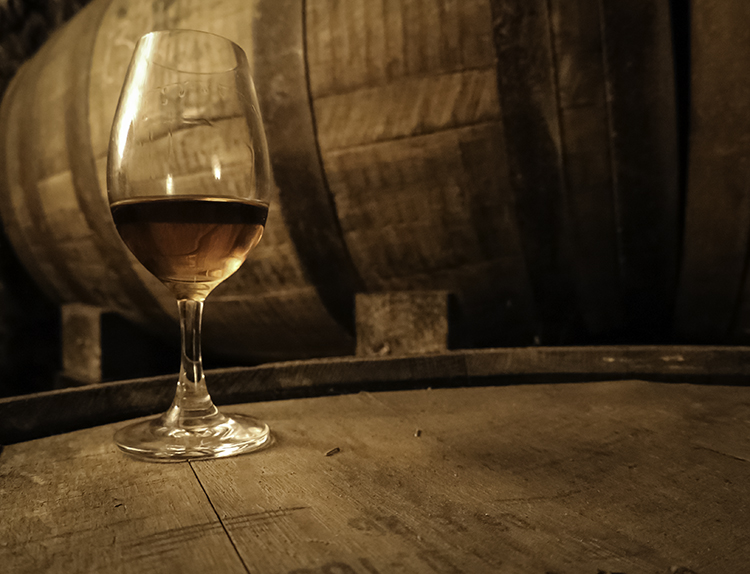 A glass of Irish Whiskey on a cask at Midleton Distillery in Ireland. Photo ©2017, Mark Gillespie/CaskStrength Media.