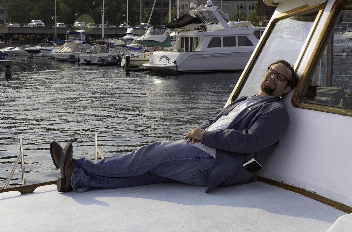 Author Fred Minnick in a rare moment of relaxation on Seattle's Lake Washington in August of 2015. Photo ©2015, Mark Gillespie/CaskStrength Media.