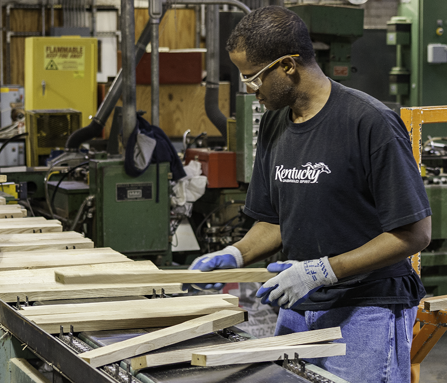 A Cooper selects staves to be made into barrel heads at the Brown-Forman Cooperage in Louisville, Kentucky. The KDA report outlines the economic impact of indirect whiskey-related jobs such as coopers in its estimate of 20,100 Bourbon-related jobs in Kentucky. Photo ©2019, Mark Gillespie/CaskStrength Media.