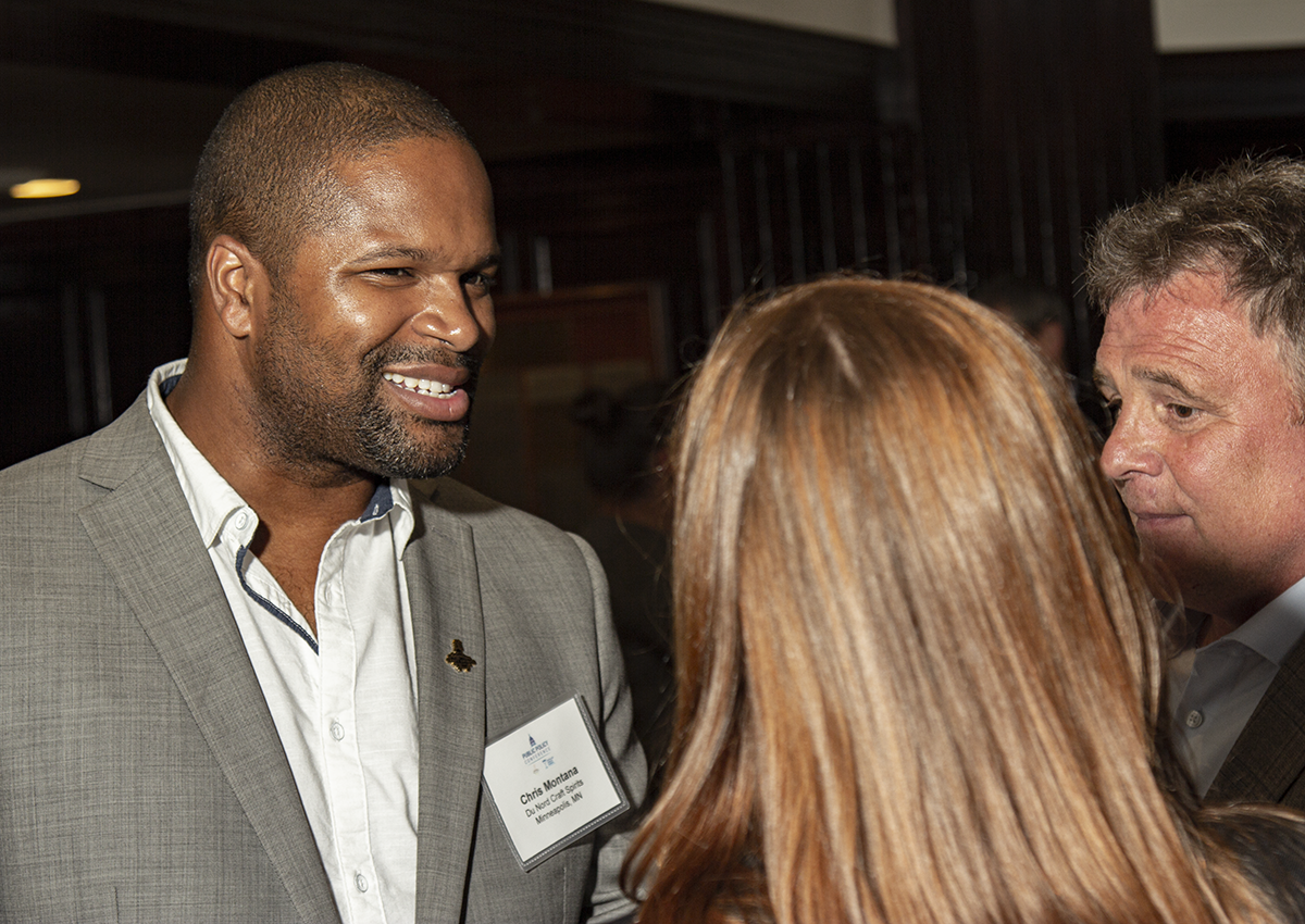 Chris Montana talks with colleagues during the Craft Spirits of America tasting at the National Press Club July 23, 2019 in Washington, DC. Photo ©2019, Mark Gillespie/CaskStrength Media.