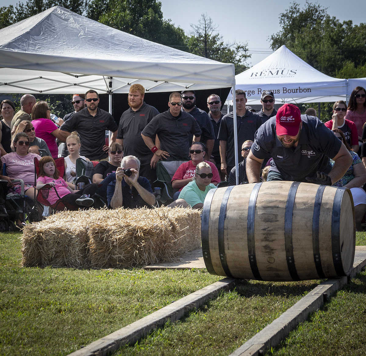 A member of the O.Z. Tyler barrel rolling team competes in the World Championship Bourbon Barrel Relay during the 2017 Kentucky Bourbon Festival. Photo ©2019, Mark Gillespie/CaskStrength Media.