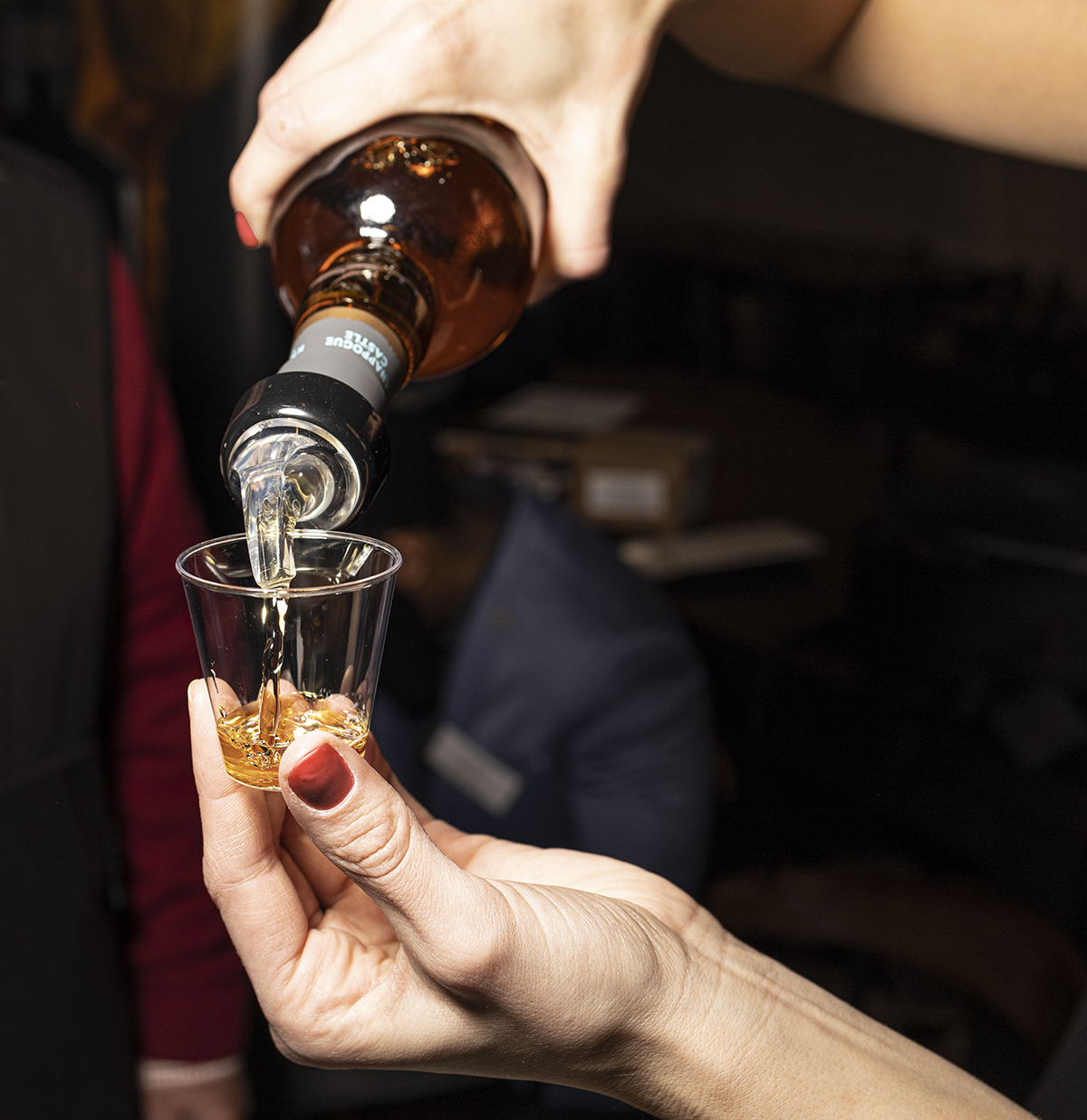 A presenter pours a whisky sample during a recent whiskey event in Philadelphia. Photo ©2020, Mark Gillespie/CaskStrength Media.