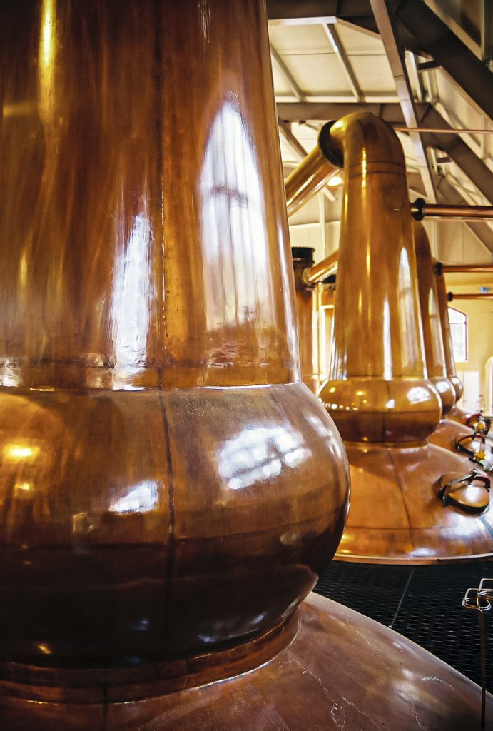 The windows of The Glenrothes still house are reflected in the stills, which are the same shape today as those used to make The Last Drop's 1970 Glenrothes. File photo ©2020, Mark Gillespie/CaskStrength Media.