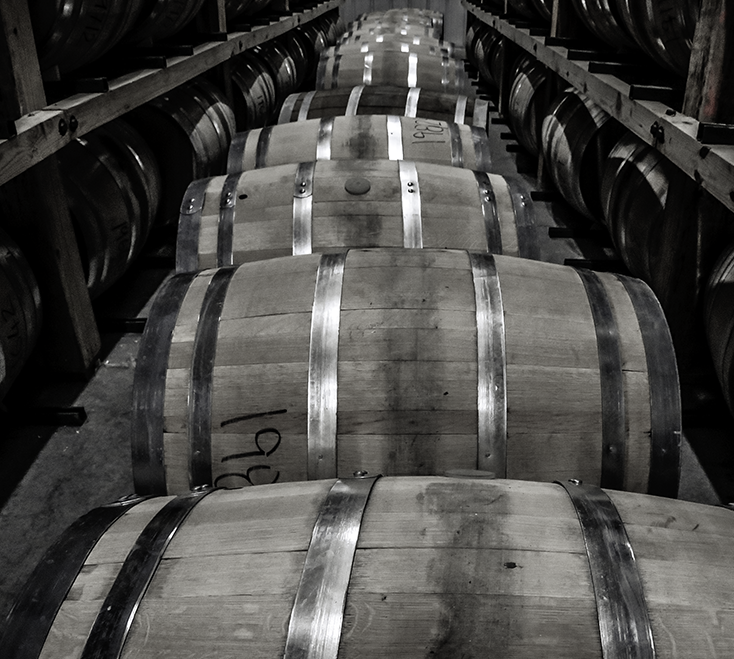 Barrels lined up in a rick house at Balcones Distilling in Waco, Texas. File photo ©2020, Mark Gillespie/CaskStrength Media.