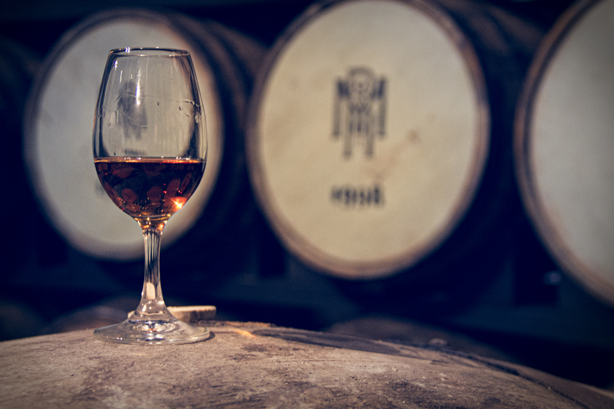 A glass of whiskey resting on a cask at Midleton Distillery in Ireland. File photo ©2020, Mark Gillespie/CaskStrength Media.