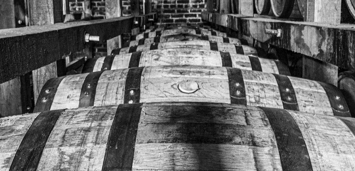 American White Oak whiskey barrels resting in a rickhouse. Photo ©2021, Mark Gillespie/CaskStrength Media.