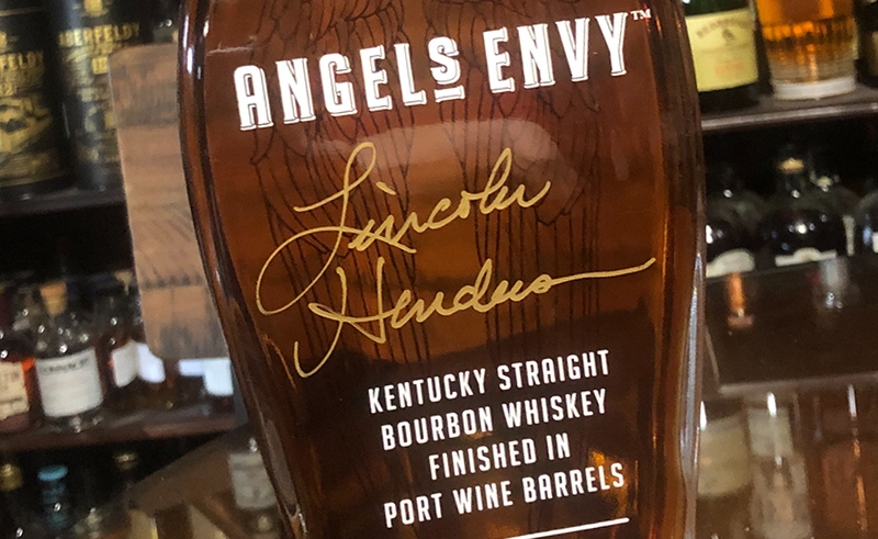 This bottle of Angel's Envy Bourbon signed by the late master distiller Lincoln Henderson is one of the items up for bids in the Kentucky Bourbon Benefit auction. Photo ©2021, Mark Gillespie/CaskStrength Media.