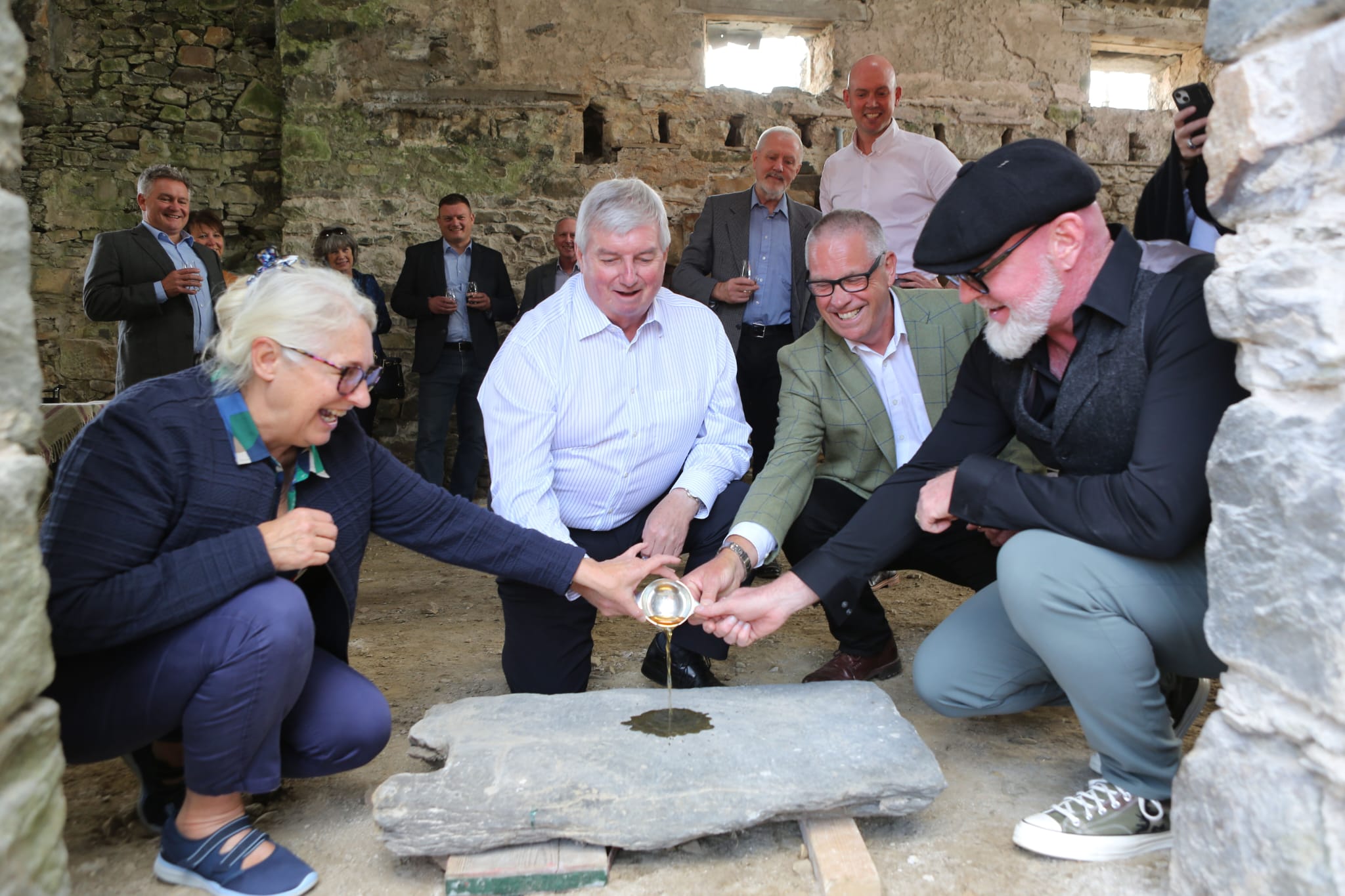 (L-R) Brigitte Gordon, Ethos Foundation, Richard Forsyth OBE, Forsyths Ltd., Alan Winchester, Christopher Bently, Bently Foundation lay the foundation stone for the Cabrach Distillery. Photo courtesy The Cabrach Trust.